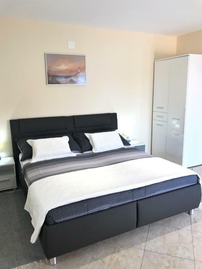 Apartmani Fortuna ลุมบาร์ดา ภายนอก รูปภาพ