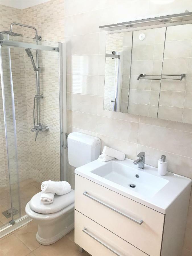Apartmani Fortuna ลุมบาร์ดา ภายนอก รูปภาพ